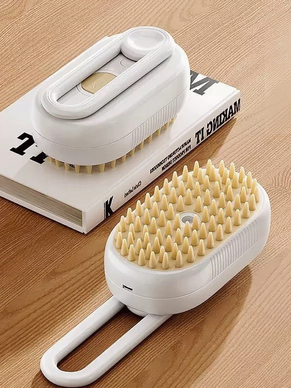 Dr. Milou Milou & Lumi 4-in-1 steam pet grooming brush with ergonomic handle and built-in water reservoir for easy dog grooming.
