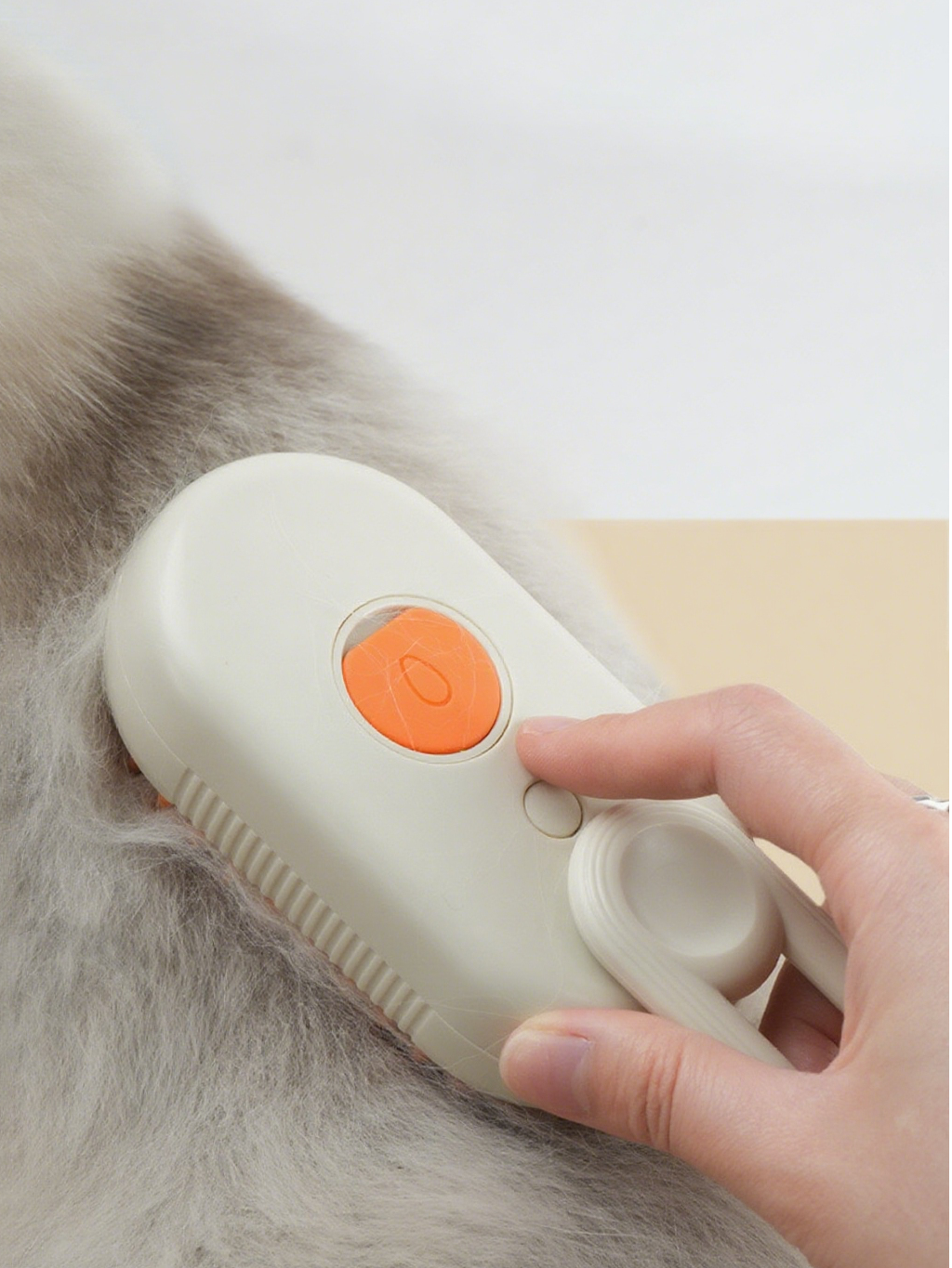 Dr. Milou Milou & Lumi 4-in-1 steam pet grooming brush with ergonomic handle and multiple grooming features.