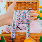 Pink pet leash featuring Hello Kitty® and Friends Flower Festival design, perfect for stylish dog walks from Sassy Woof.