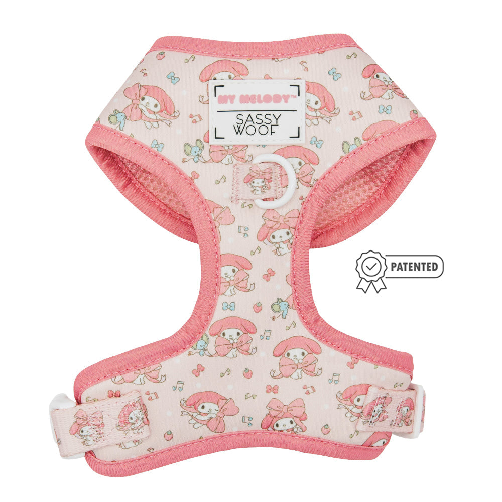 Dog adjustable harness featuring My Melody™ design by Sassy Woof, with pink fabric and secure adjustable straps for comfort.