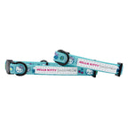 Sassy Woof Hello Kitty® aqua cat collar with pink bow and adjustable strap, made for small pets in a bright, playful design.