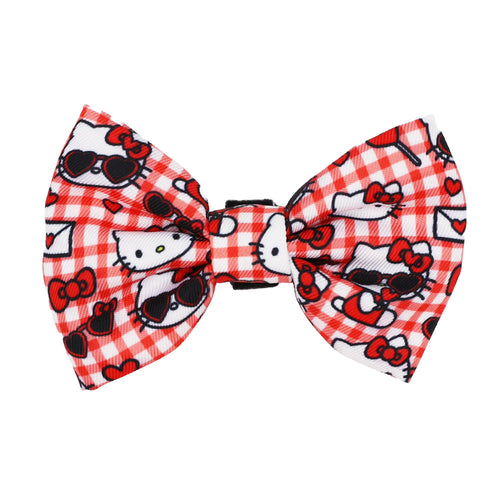 Red Hello Kitty® cat bowtie from Sassy Woof, stylish accessory for pets, featuring classic Hello Kitty design with a charming look.