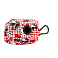 Red Hello Kitty dog waste bag holder by Sassy Woof, featuring classic Hello Kitty design, used for pet waste disposal.