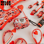 Red Hello Kitty dog waste bag holder by Sassy Woof, featuring a cute cartoon cat design for pet waste disposal.