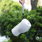 Portable collapsible pet water bottle by Dr. Milou, featuring a compact design with a built-in water bowl for pets on the go.