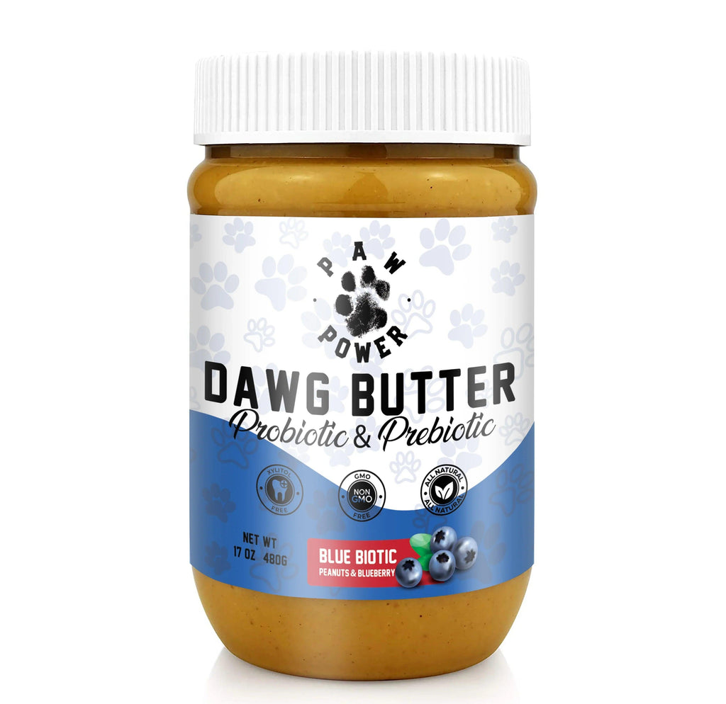 Paw Power Nutrition Dawg Butter Blue Biotic with berries, showing the jar and blueberry ingredients on a white background.