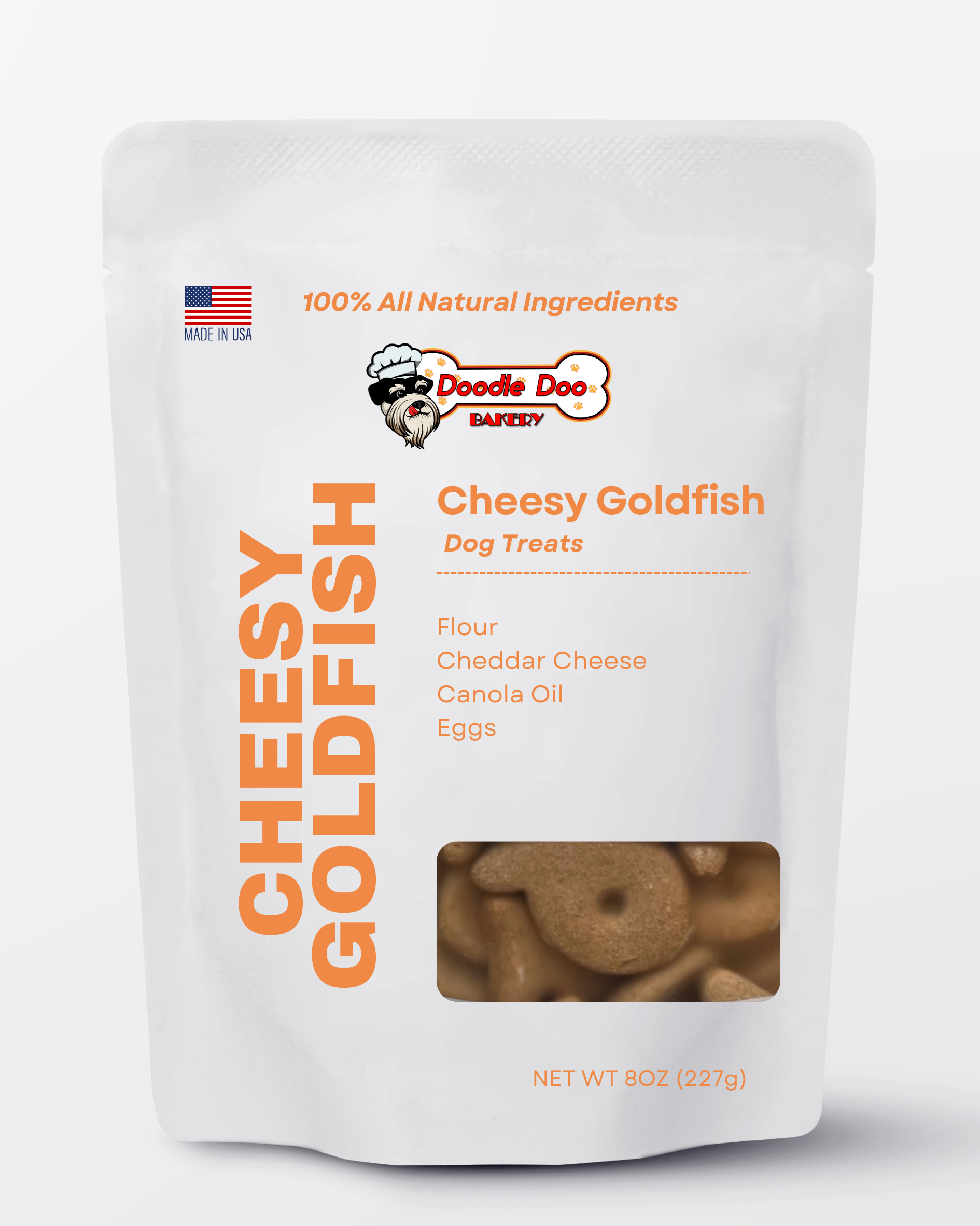 Homemade Doodle Doo Bakery cheesy Goldfish dog treats in a half-pound bag, showing crunchy fish-shaped treats for dogs.