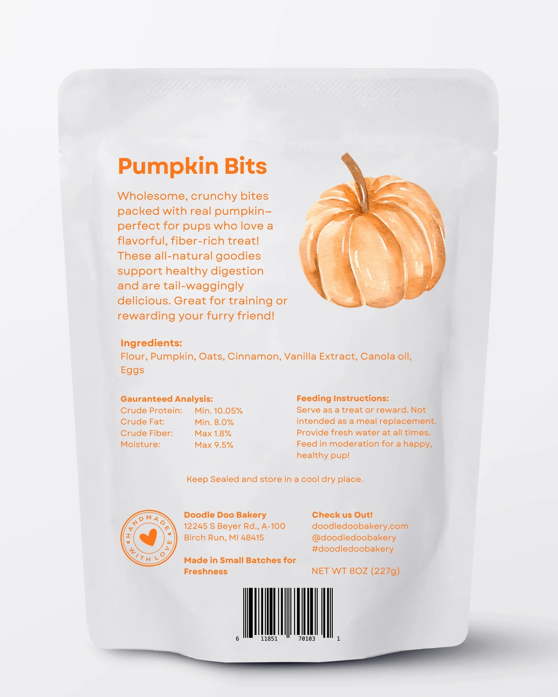 Homemade pumpkin dog treats by Doodle Doo Bakery featuring pumpkin bits in 1/2lb bag, designed for dogs.