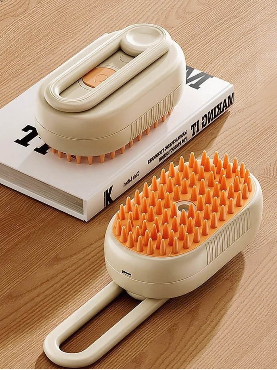 Dr. Milou Milou & Lumi 4-in-1 Steam Pet Grooming Brush showing the brush head and handle with steam vents for pet grooming
