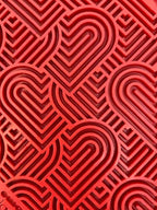 Love eMat enrichment lick mat for dogs and cats with a heart design, made by SodaPup, featuring a flexible silicone surface.
