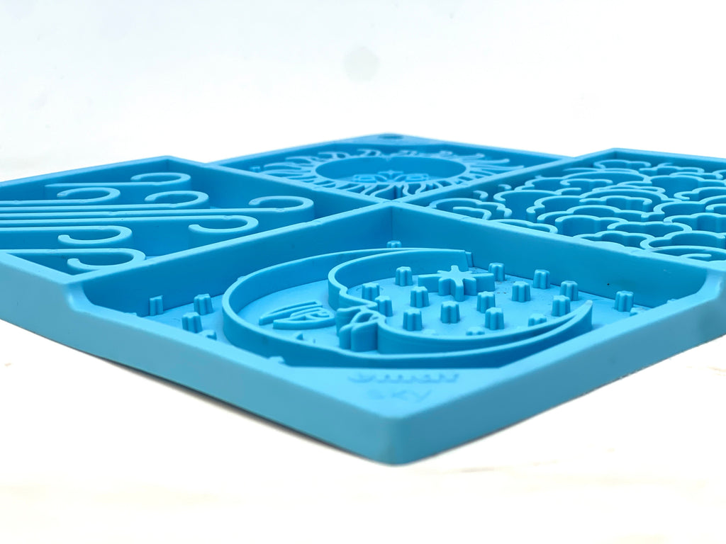 Light blue Sky eMat enrichment lick mat for dogs and cats with celestial design by SodaPup, ideal for mental stimulation.