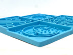 Light blue Sky eMat enrichment lick mat for dogs and cats with celestial design by SodaPup, ideal for mental stimulation.