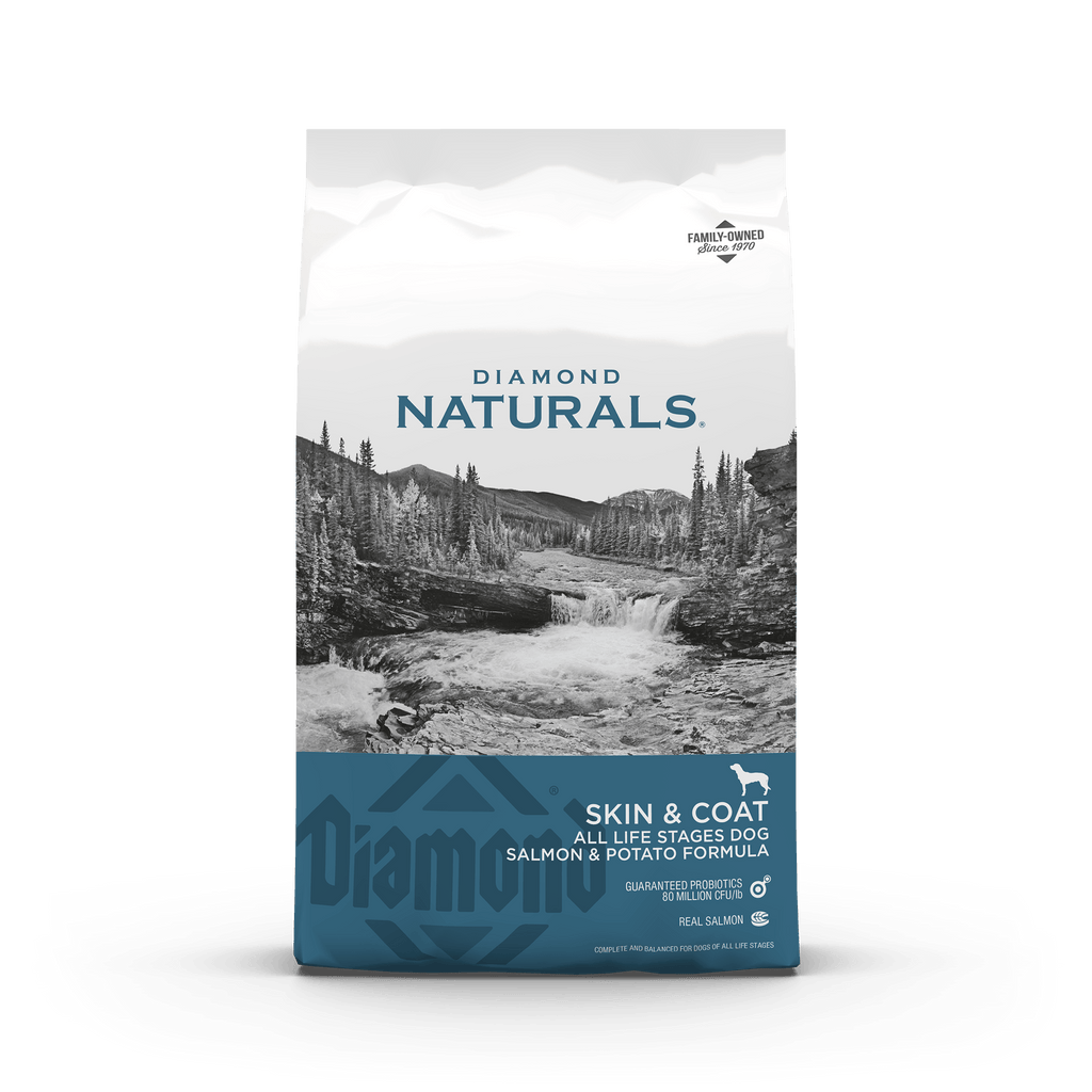 Dry dog food bag from Diamond Naturals for adult dogs, Salmon and Potato flavor, designed to support skin and coat health.